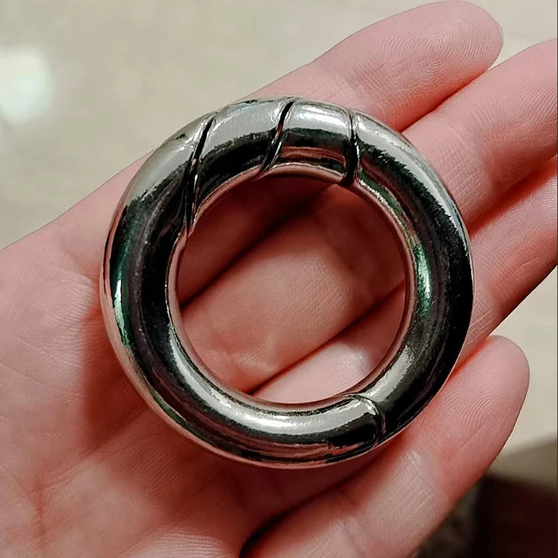 Puzzle anneau métallique magique