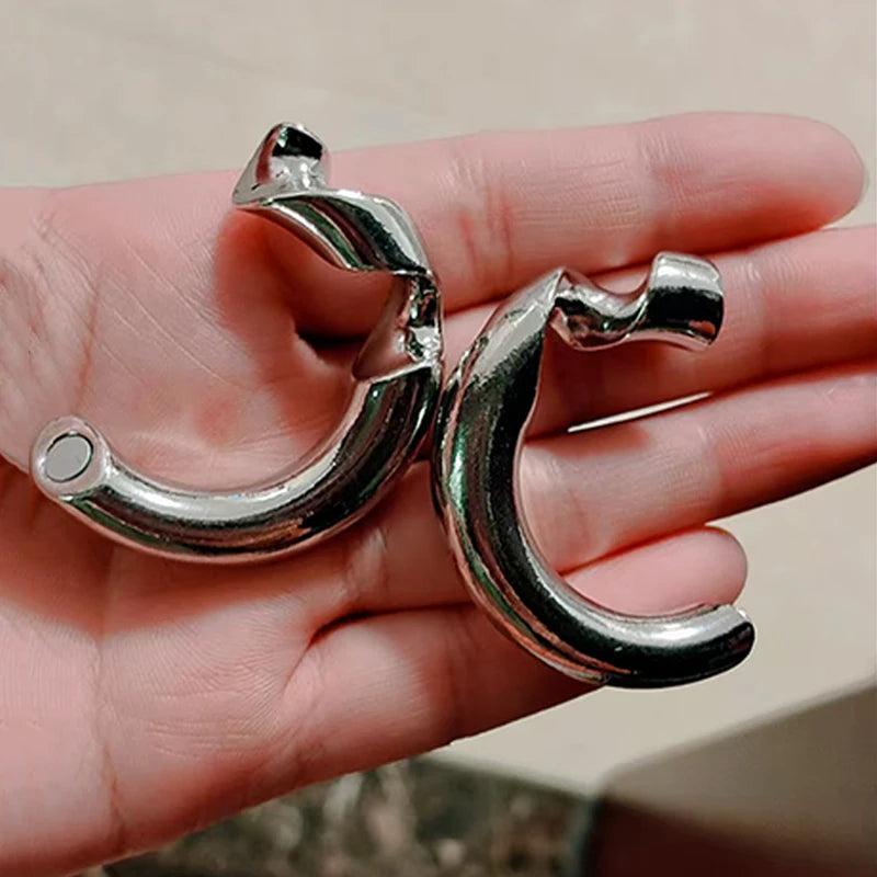 Puzzle anneau métallique magique